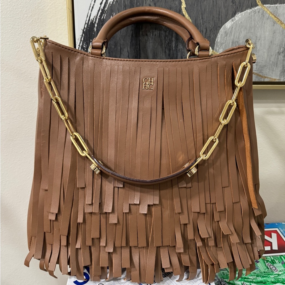 Carolina Herrera leather purse with fringes